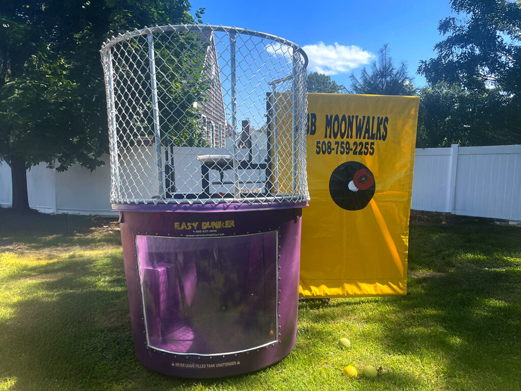 dunk tank rental setup in a backyard in plymouth, ma