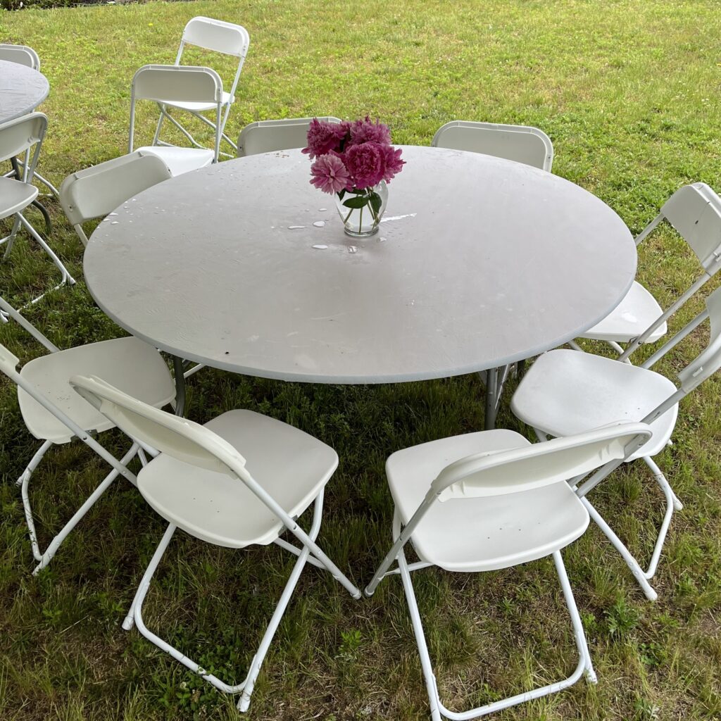 white round table rental and white chair rentals setup in backyard in plymouth, ma